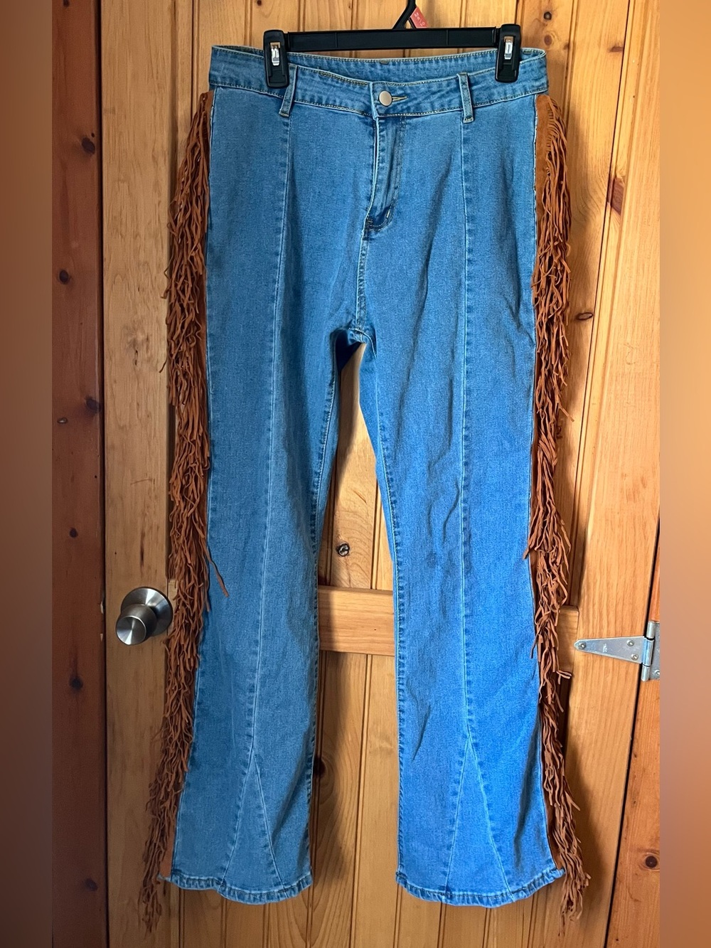 Women’s bell bottom fringe jeans